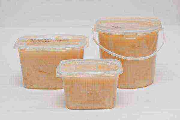 Packaged cotton honey in plastic containers
