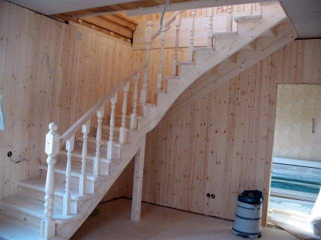 Wooden flight stairs with a turn