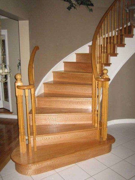 Photo of stairs to the second floor of a private house with winder steps