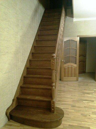 In the photo - a wooden staircase with one flight