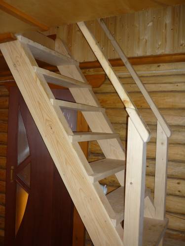 The photo shows a typical and illustrative example of a ladder with your own hands - the design and progress of the work is readable, just by looking at the result