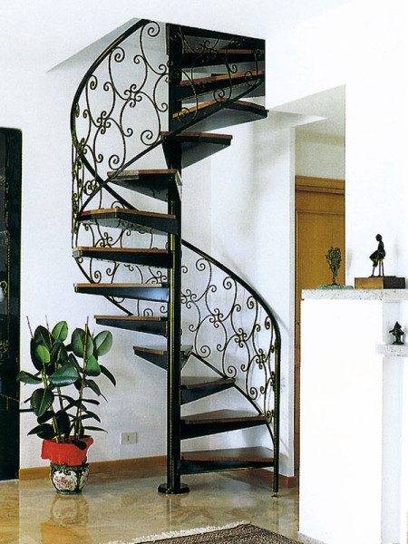 A spiral staircase takes up half the space, but at the same time it is more dangerous for the ascent and descent of small children