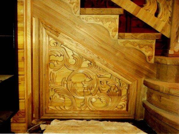 Intricate patterns on a carved ladder